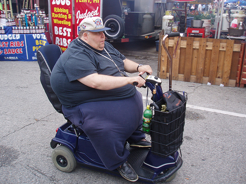 Image result for fat guy electric wheelchair